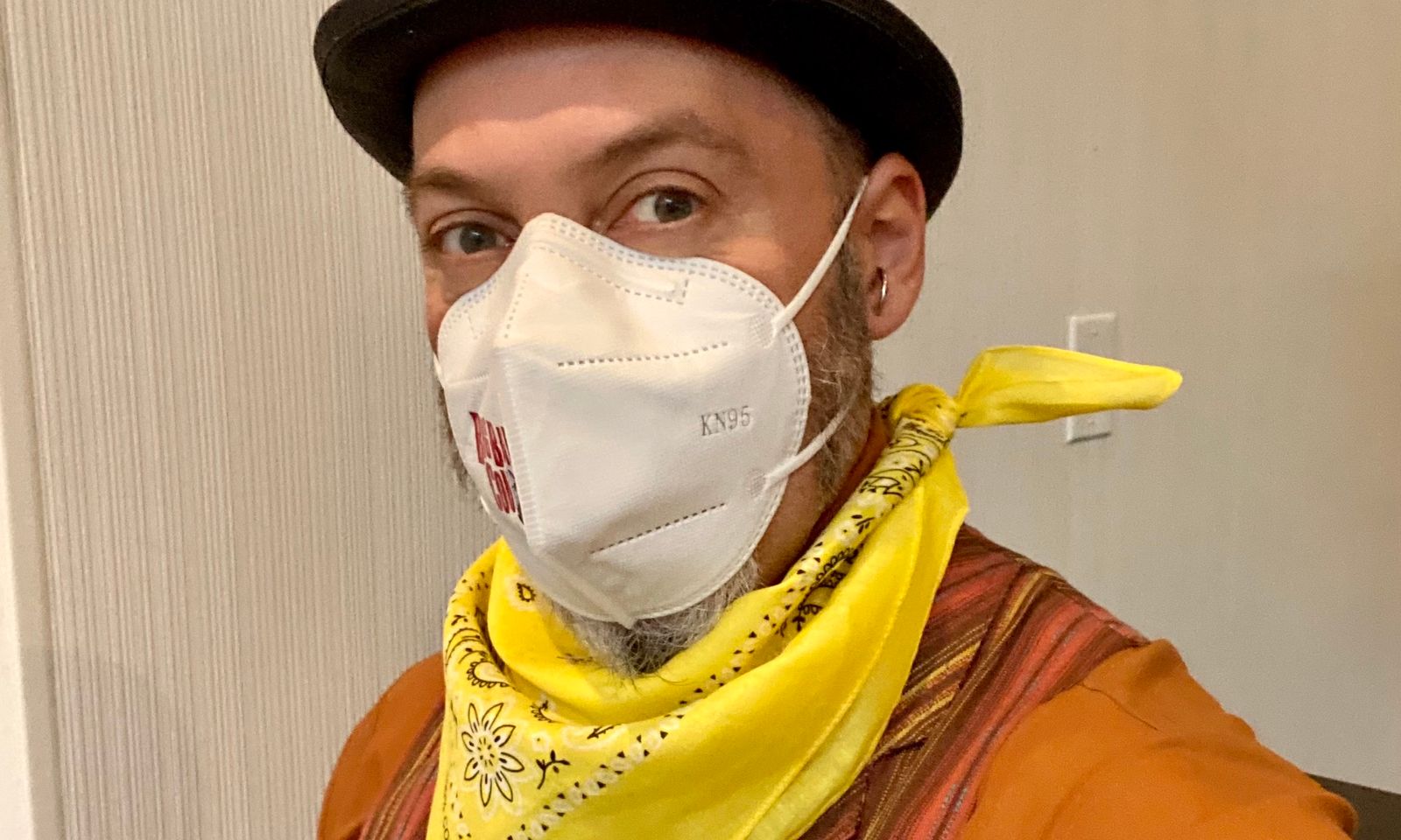 Me doing my Big Bad Con greeter shift, dressed snappy with a bowler, vest, tie, my yellow Ranger bandana, and a N95 mask.